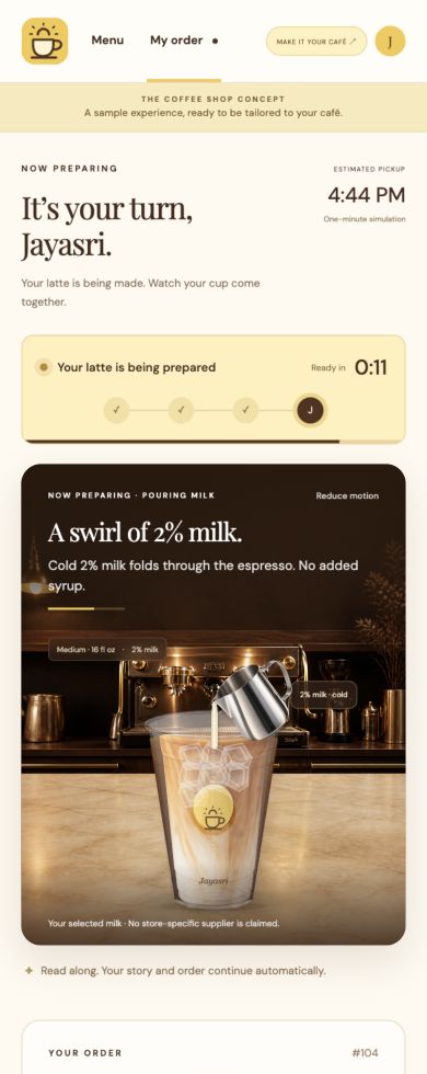 Milk pouring into the demo iced latte after ice and espresso